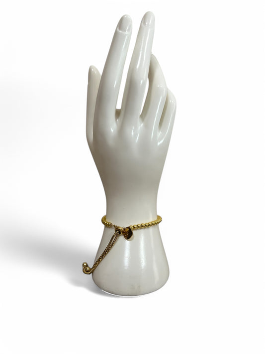 Pulsera bolas doradas